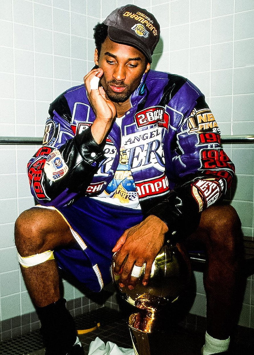 Kobe Bryant Sitting With NBA Championship Trophy In Locker Room HD phone wallpaper