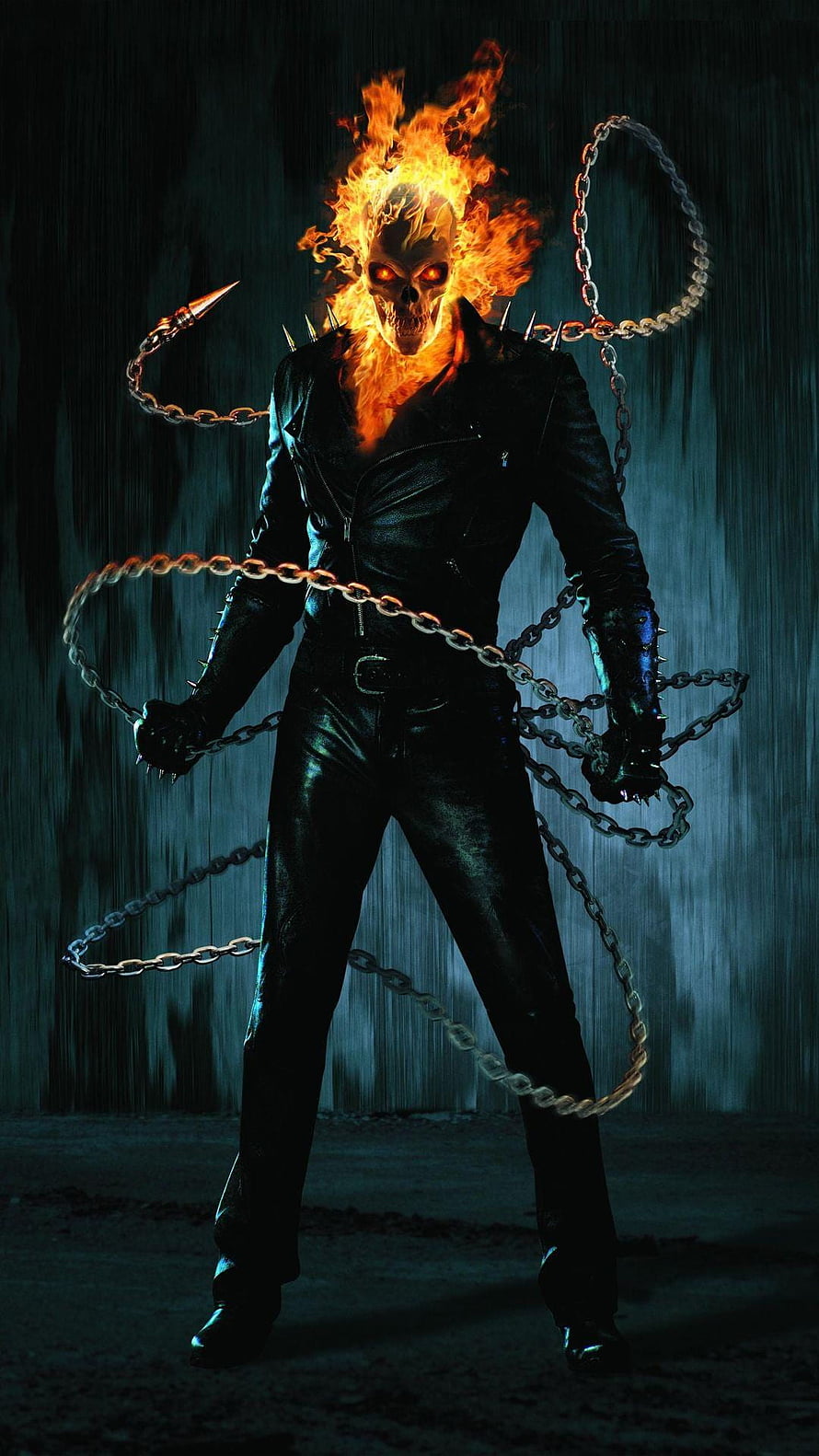 Ghost Rider flaming skull and spiked chains in dark cinematic pose HD phone wallpaper
