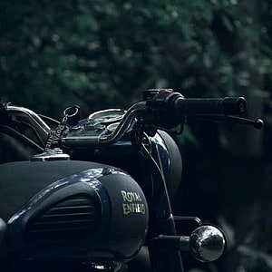 Royal Enfield Classic Motorcycle Handlebar and Tank Detail in Dark Forest Setting HD phone wallpaper