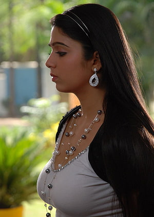 Charmi Kaur in Profile with Long Dark Hair, Pearl Necklace, and Teardrop Earrings HD phone wallpaper