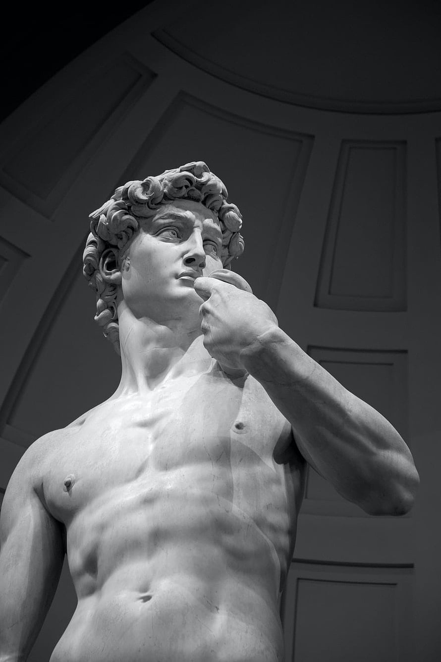 Black and White Close-Up of Michelangelo's David Statue Head and Torso HD phone wallpaper