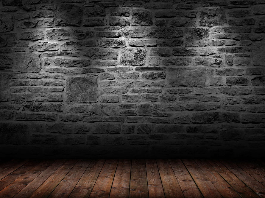 Dark Stone Brick Wall with Wooden Floor in Moody Interior Setting HD wallpaper