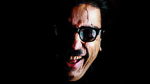Anbe Sivam Character Portrait With Dark Sunglasses And Intense Expression HD wallpaper