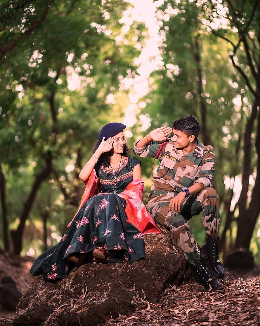 Indian Army Couple Saluting in Forest with Traditional Attire HD phone wallpaper