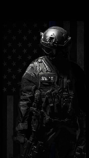 Tactical SWAT Officer in Full Gear Standing Before American Flag HD phone wallpaper