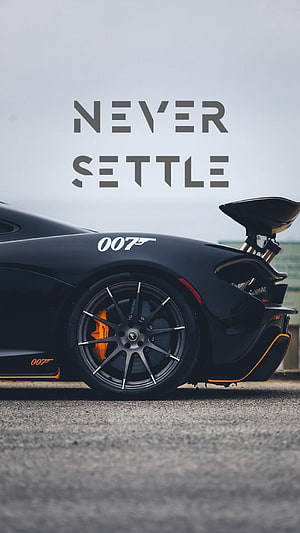 McLaren 007 Edition Rear Quarter View with Never Settle Slogan HD phone wallpaper