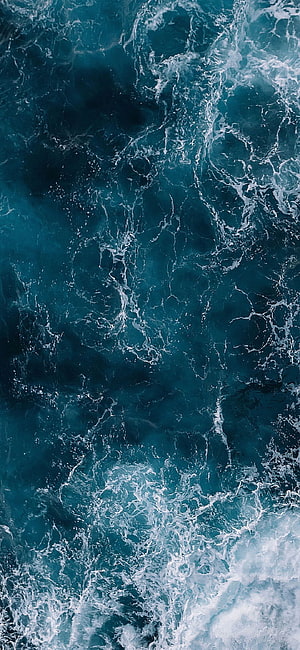 Aerial View of Turquoise Ocean Waves with White Sea Foam and Deep Blue Water HD phone wallpaper
