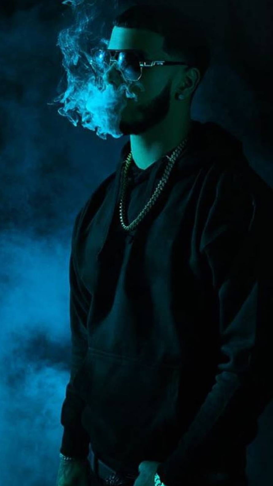 Drake smoking with blue smoke in dark hoodie and sunglasses HD phone wallpaper