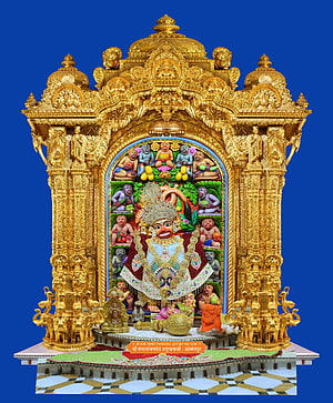 Kashtbhanjandev Temple Sarangpur Golden Shrine with Monkey Figures and Ornate Carvings HD phone wallpaper