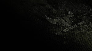 Asus TUF Gaming Logo on Dark Textured Background with The Ultimate Force Tagline HD wallpaper