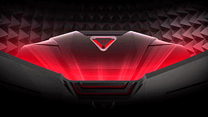 Red Alienware Gaming Laptop Lid with Glowing Logo and Geometric Background HD wallpaper