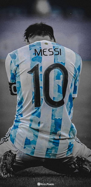 Lionel Messi Argentina National Team Jersey Number 10 Kneeling on the Pitch HD phone wallpaper