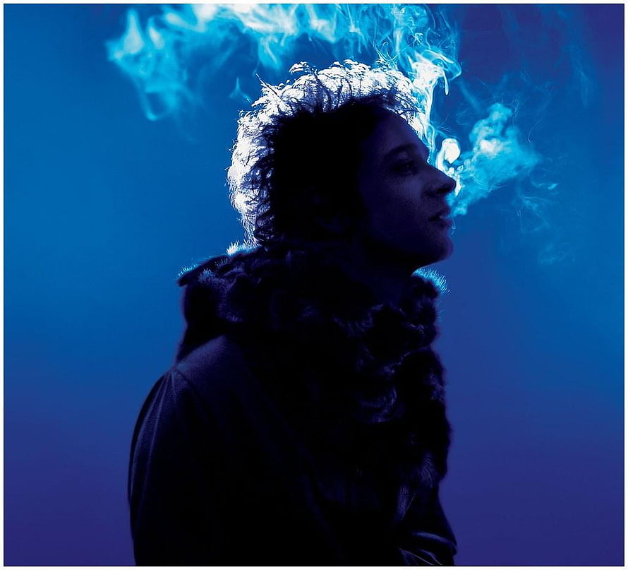 Silhouette of a person exhaling smoke against a blue background HD wallpaper