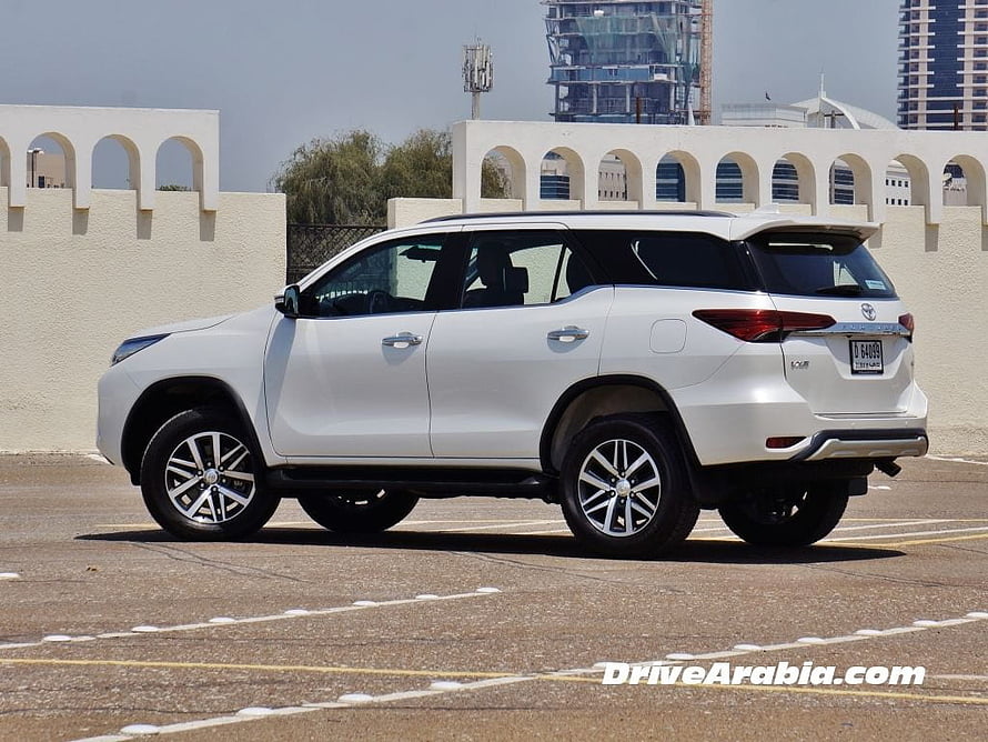 White Toyota Fortuner SUV Parked in Urban Setting HD wallpaper