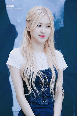 Rose from Blackpink in a white t-shirt and denim corset top with long blonde hair HD phone wallpaper