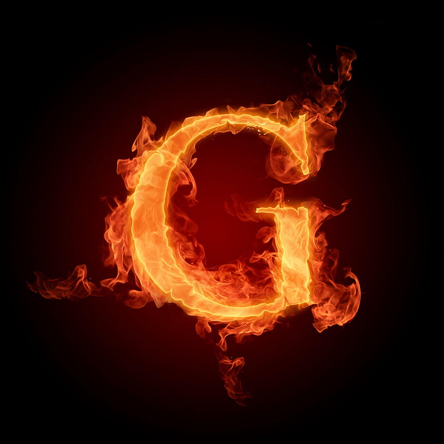 Flaming Letter G Fire Typography Design on Dark Background HD phone wallpaper