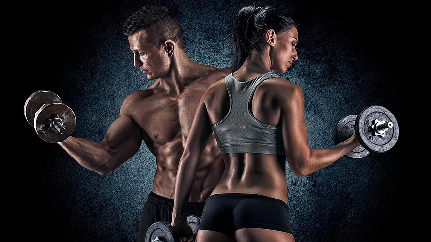 Muscular Man And Woman Lifting Dumbbells In Dramatic Gym Setting, 6 Fitness, gym body HD wallpaper