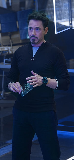 Robert Downey Jr as Tony Stark in Avengers Endgame Holding Arc Reactor Technology HD phone wallpaper