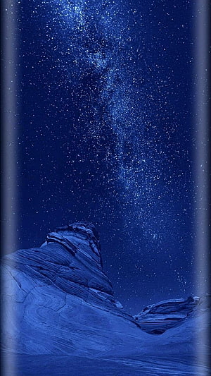 Starry Night Sky Over Layered Rock Formations HD phone wallpaper