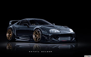 Black Toyota Supra MK4 with Gold Wheels and Widebody Kit on Dark Background HD wallpaper