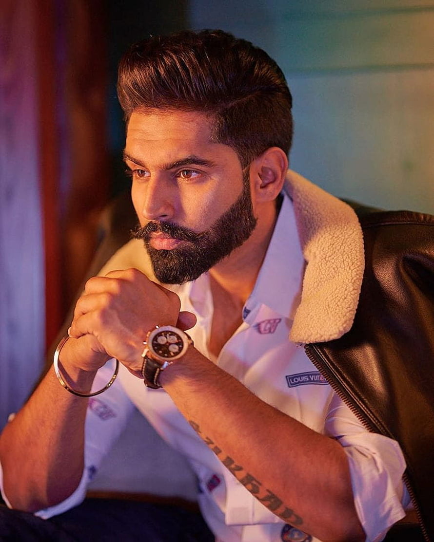 Parmish Verma in a stylish white shirt and leather jacket with a prominent beard and wristwatch HD phone wallpaper