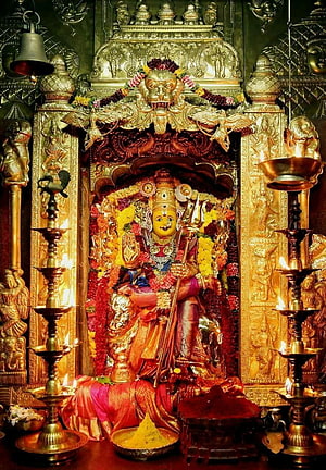 Golden Statue of Hindu Goddess Durga in Temple Shrine with Oil Lamps HD phone wallpaper