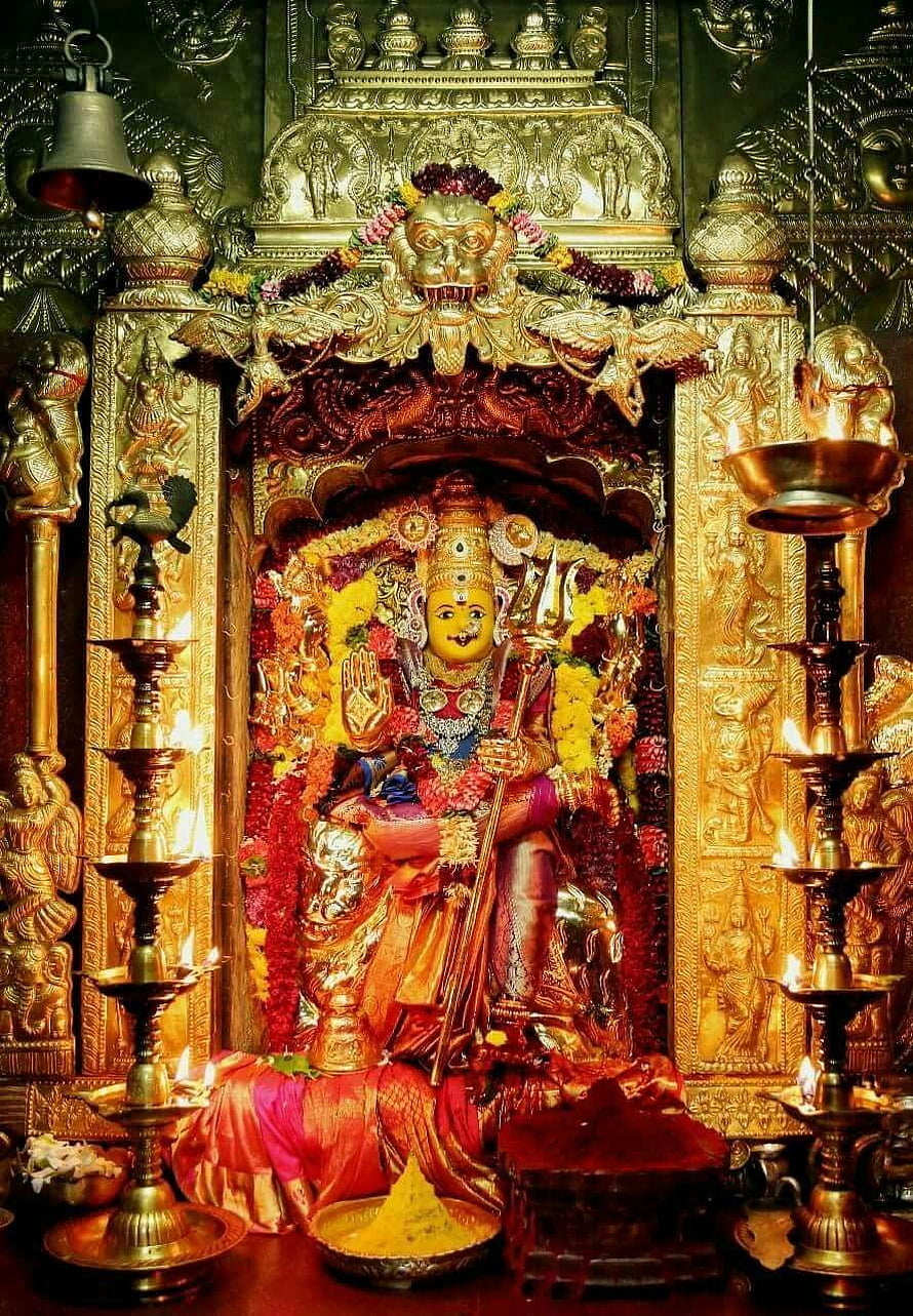Golden Statue of Hindu Goddess Durga in Temple Shrine with Oil Lamps HD phone wallpaper