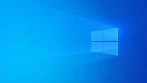 Windows 10 Default Blue Light Theme with Glowing Window Logo on Gradient Background HD wallpaper
