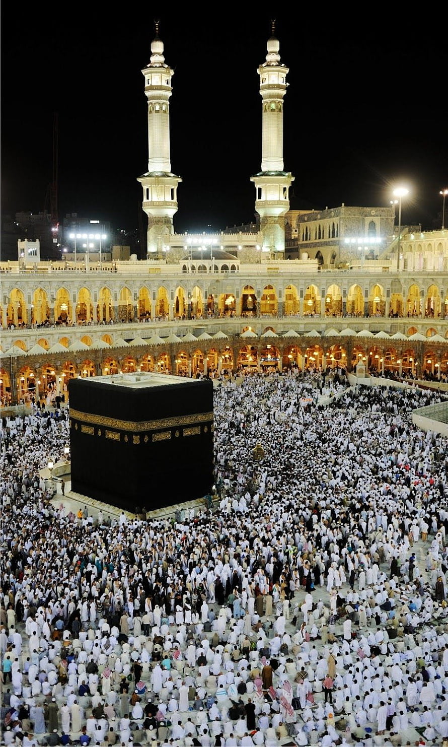 Kaaba at Night with Pilgrims Performing Tawaf in Mecca HD phone wallpaper