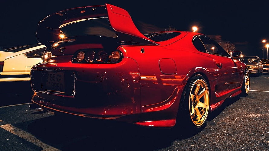 Red Toyota Supra Rear View with Gold Wheels at Night HD wallpaper