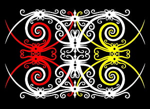 Symmetrical Dayak Tribal Ornament with Red and Yellow Spirals on Black Background HD wallpaper