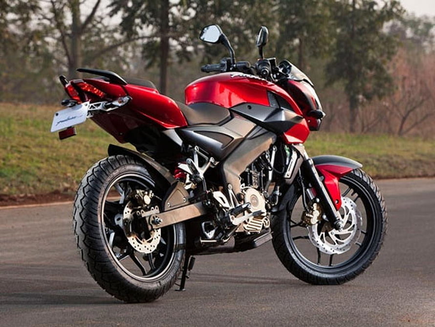 Red Bajaj Pulsar NS200 Motorcycle Parked on Asphalt Road HD wallpaper