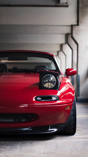 Red Mazda Miata NA Front End Detail in Concrete Parking Garage HD phone wallpaper