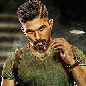 Allu Arjun intense portrait smoking cigar in green t-shirt with map background HD phone wallpaper