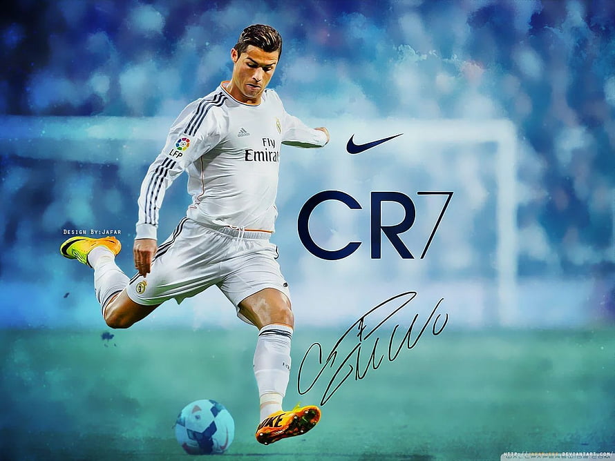 Cristiano Ronaldo in Real Madrid Kit Striking a Football on the Pitch HD wallpaper