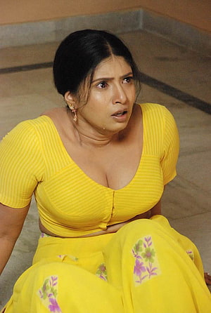 Sanghavi Movie Still: Woman in Yellow Saree with Distressed Expression, Sanghavi []: Latest , Stills of Sanghavi, #sanghavi HD phone wallpaper