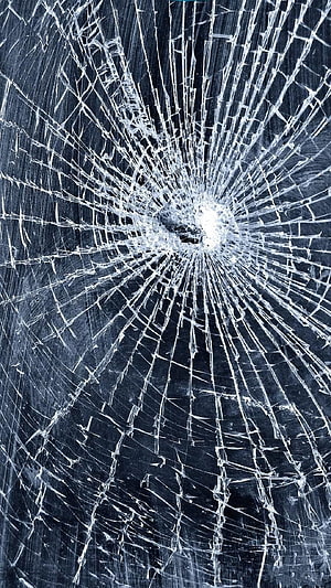 Shattered Glass Texture with Radiating Fracture Lines on Dark Blue Background HD phone wallpaper