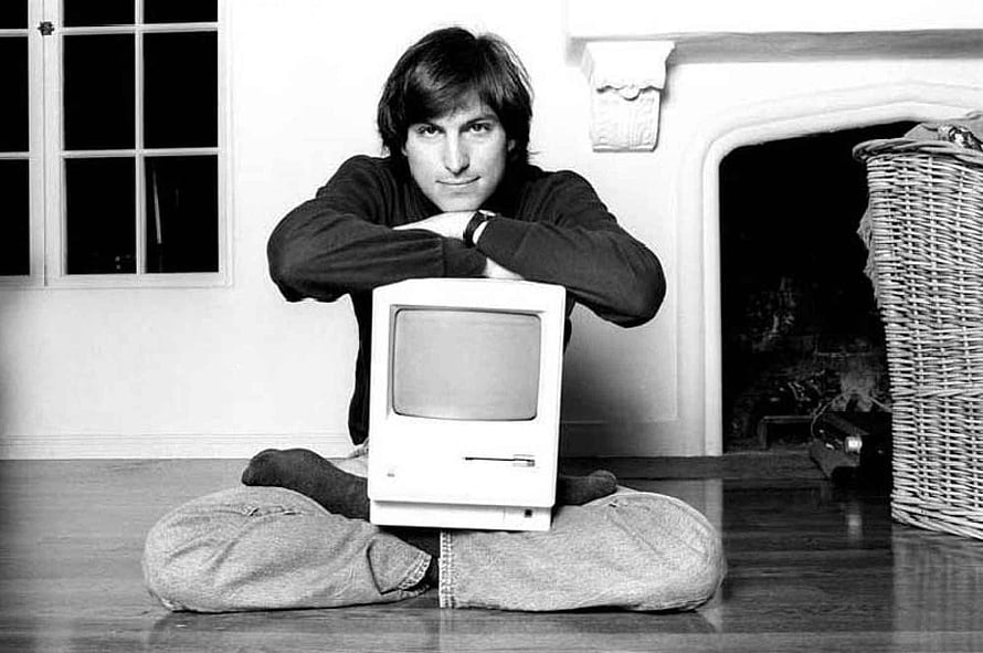 Steve Jobs Sitting Cross-Legged with Early Apple Computer in Black and White HD wallpaper