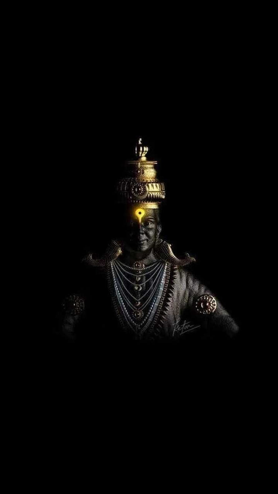 Dark Portrait of Hindu Deity with Glowing Third Eye and Golden Crown HD phone wallpaper