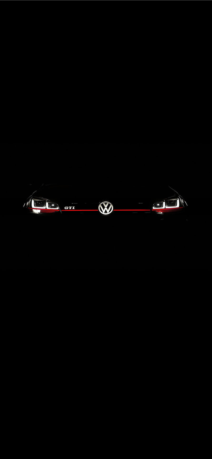 Volkswagen Golf GTI Front View With Red Stripe And Headlights In Dark HD phone wallpaper