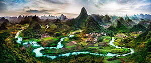 Aerial View of Karst Mountains and Winding River in Rural China HD wallpaper