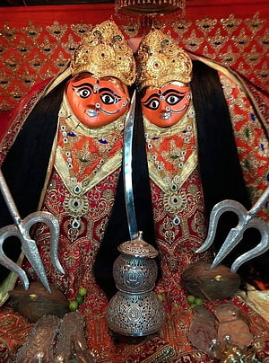 Kali and Durga Hindu Goddess Statues with Tridents and Offerings HD phone wallpaper