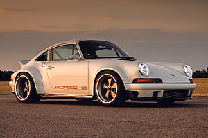Silver Porsche 911 Singer DLS Widebody Coupe on Asphalt at Sunset HD wallpaper