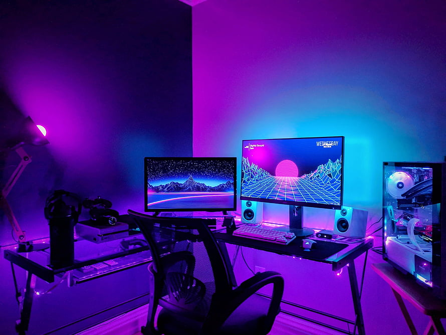Neon Purple and Blue Gaming Setup with Retro Synthwave Wallpapers and RGB Lighting HD wallpaper