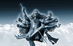 Lord Shiva Multi-Armed Statue with Trident and Weapons Against Cloudy Sky HD wallpaper