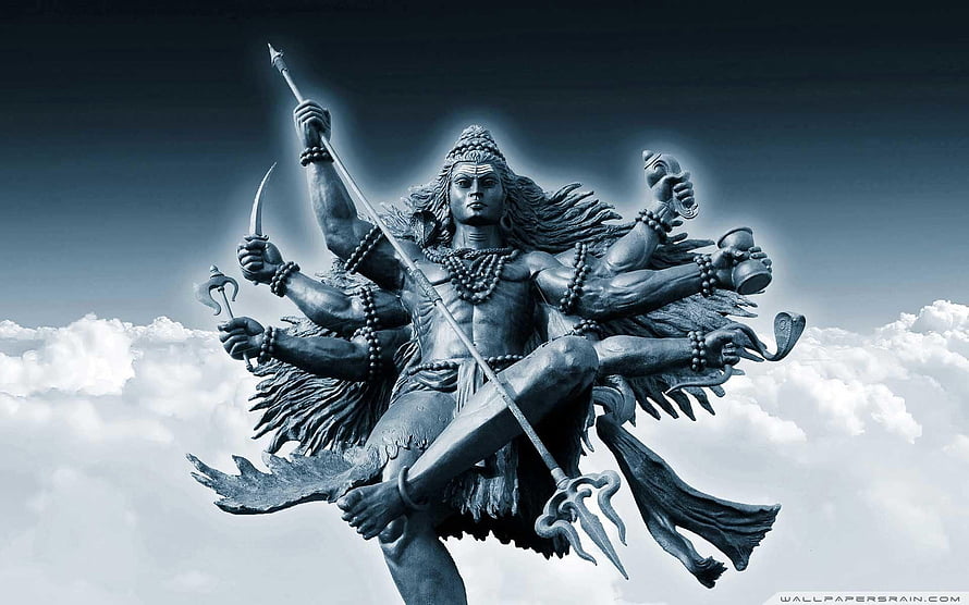 Lord Shiva Multi-Armed Statue with Trident and Weapons Against Cloudy Sky HD wallpaper