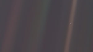 Pale Blue Dot Earth Photograph Against Dark Space Background HD wallpaper