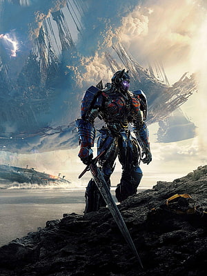 Transformers The Last Knight Warrior Robot Standing On Rocky Terrain With Sword HD phone wallpaper