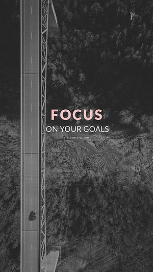 Aerial View of a Highway Cutting Through a Dense Forest with Motivational Text Overlay HD phone wallpaper