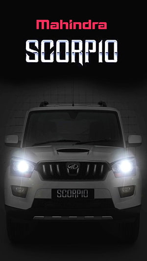 Mahindra Scorpio S11 Front View with Bright Headlights on Dark Background HD phone wallpaper